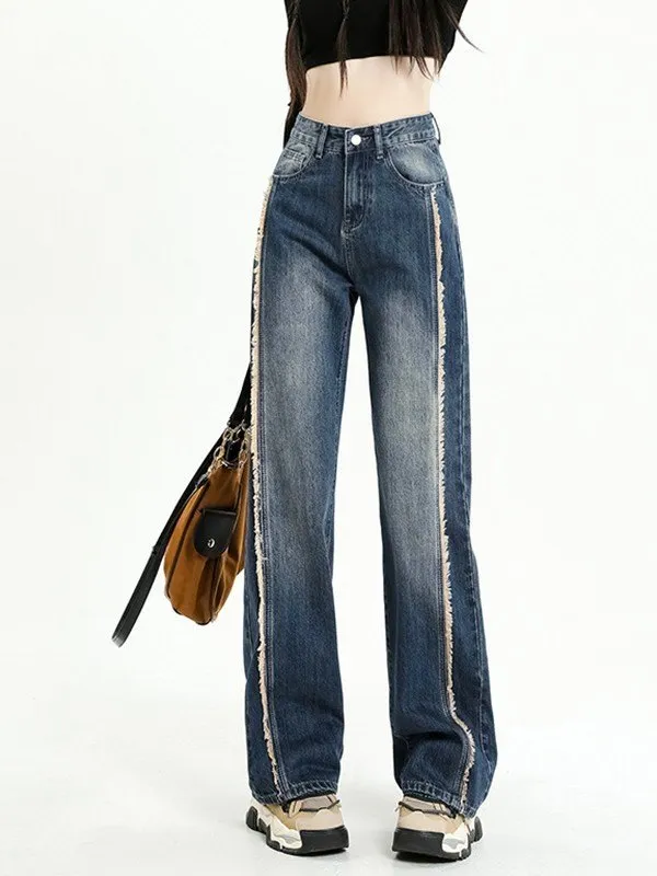 Vaqueros boyfriend desgastados con patchwork desteñido